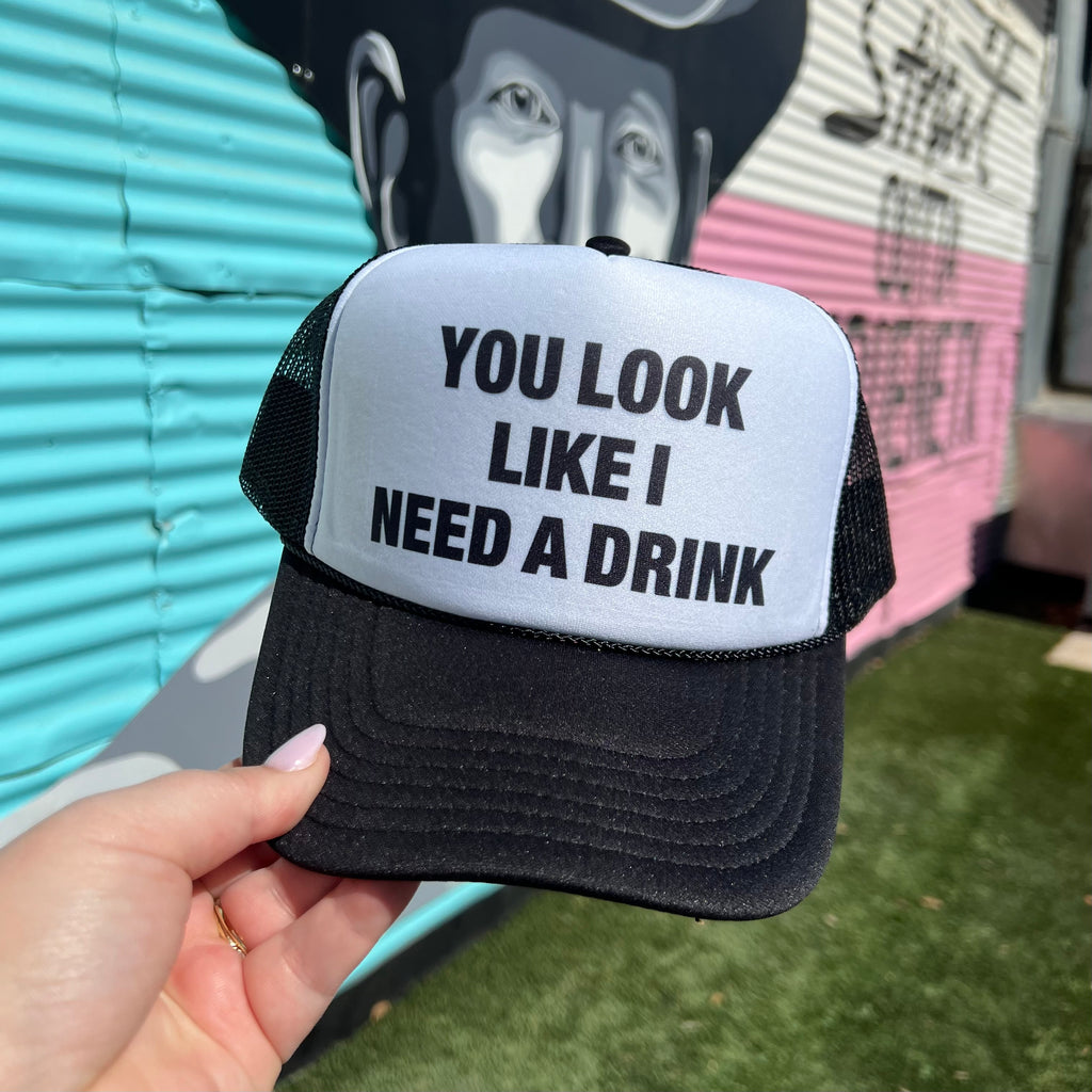 You Look Like I Need A Drink Trucker Cap (Multiple Color Options)